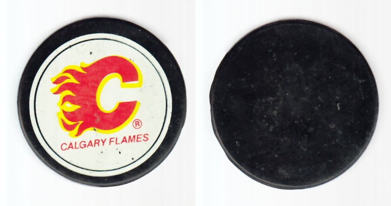 1980-87 NHL VICEROY CALGARY FLAMES PUCK photo 1980-87 NHL VICEROY CALGARY FLAMES PUCK photo