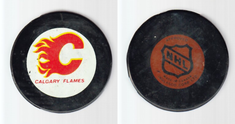 1980-85 NHL VICEROY CALGARY FLAMES GAME PUCK photo 1980-85 NHL VICEROY CALGARY FLAMES GAME PUCK photo
