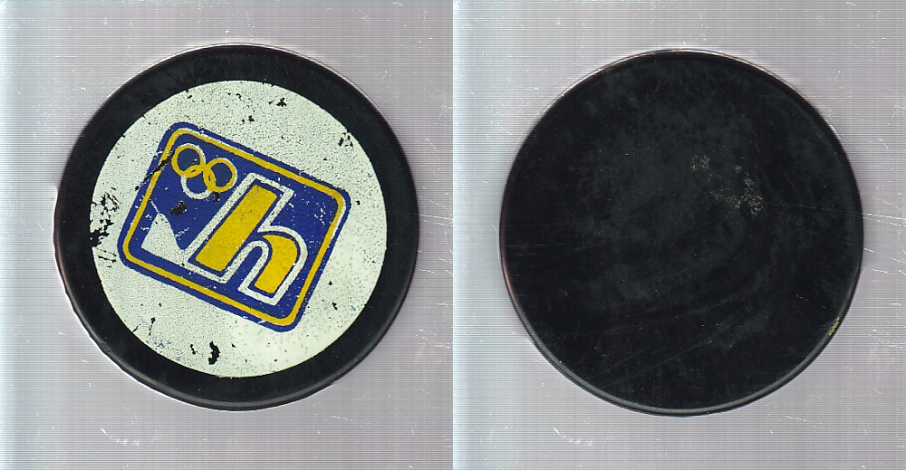 1975-83 C23 HULL OLYMPICS PUCK photo 1975-83 C23 HULL OLYMPICS PUCK photo
