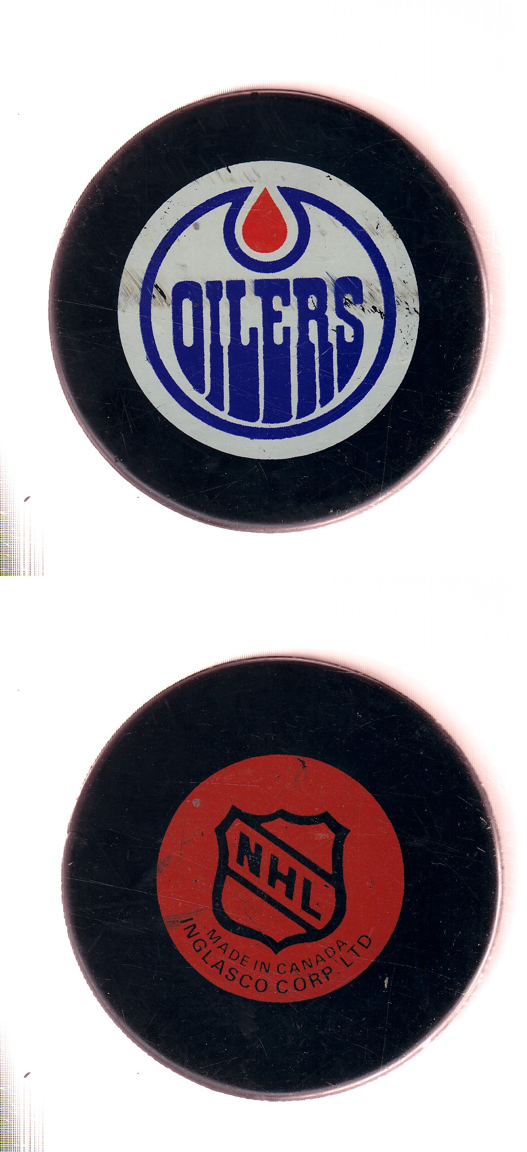 1985-92 IN GLAS CO EDMONTON OILERS GAME PUCK photo 1985-92 IN GLAS CO EDMONTON OILERS GAME PUCK photo