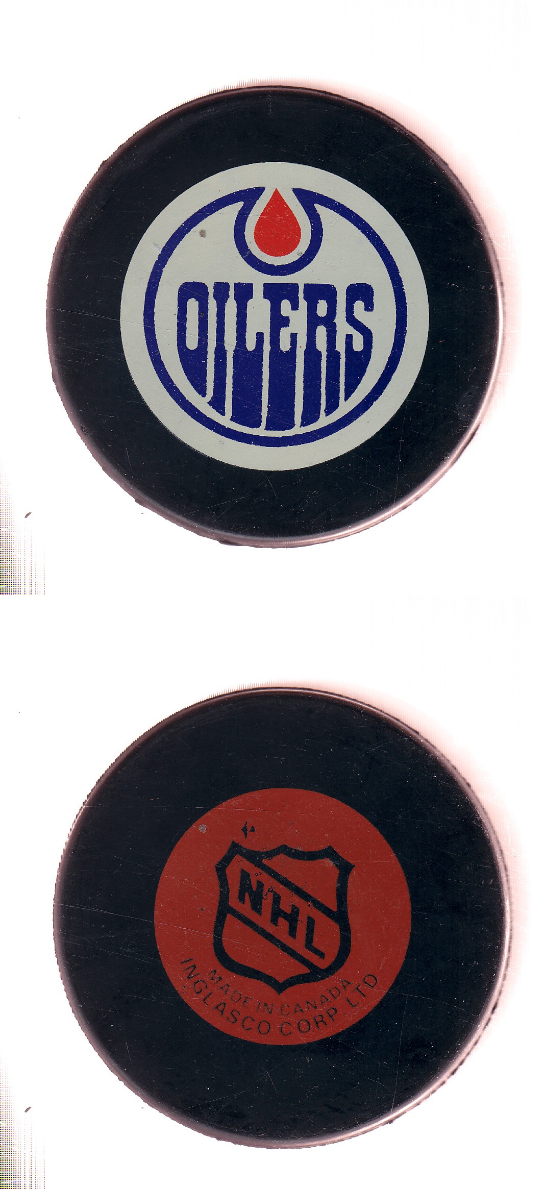 1985-92 IN GLAS CO EDMONTON OILERS GAME PUCK photo 1985-92 IN GLAS CO EDMONTON OILERS GAME PUCK photo